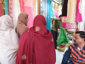 Families buying saris.